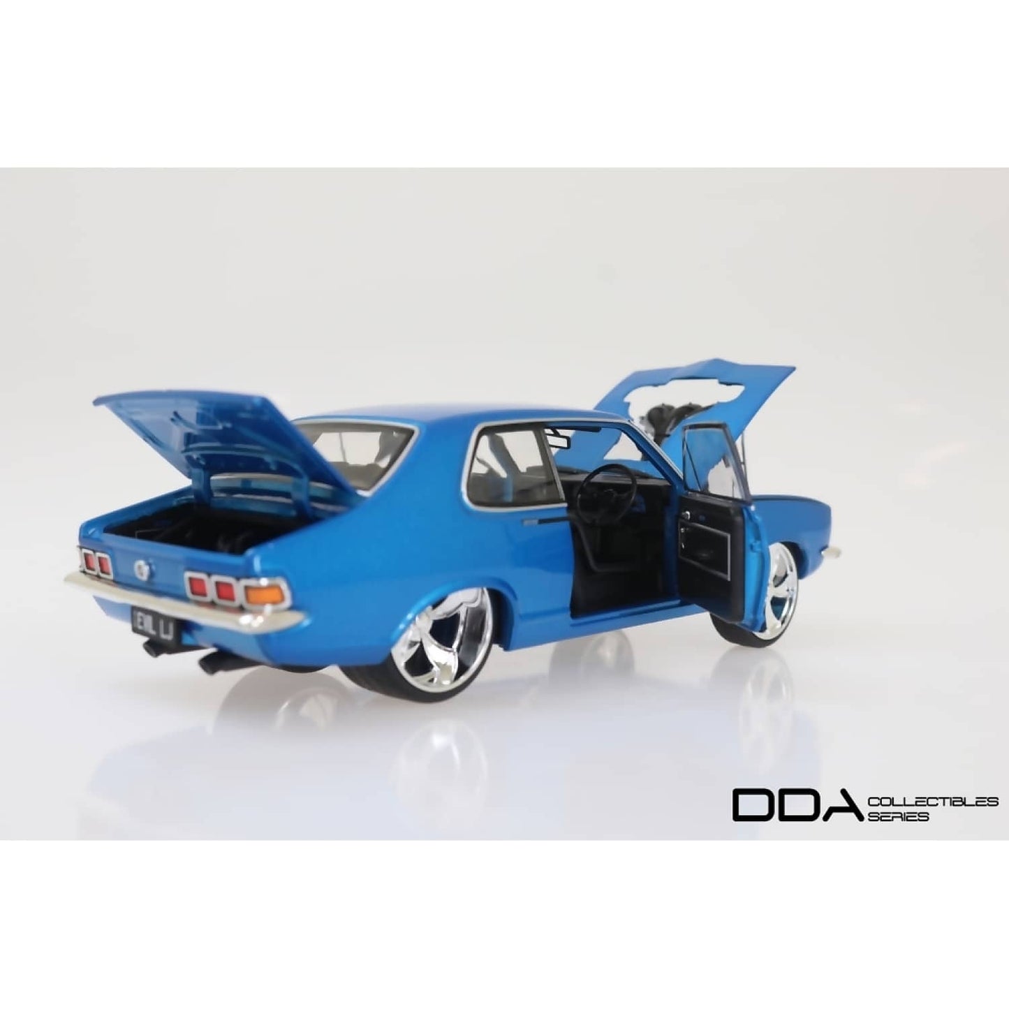 DDA Collectibles 1:24 Scale - Metallic Blue Evil LJ 1973 Holden LJ Torana - Diecast Model